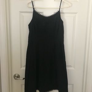 Woman’s black dress.